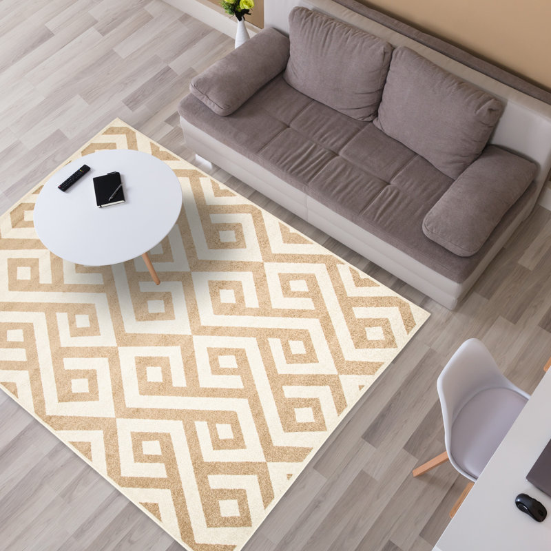 Ivory Geometric Synthetic 5'x8' Rectangular Area Rug