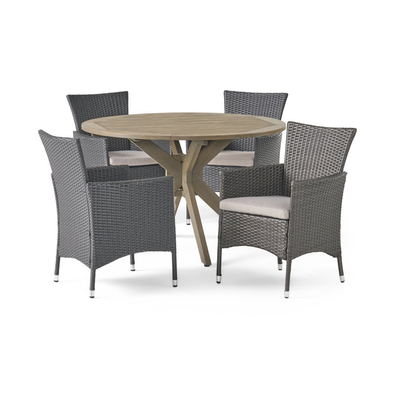Stennis 4 - Person Acacia Wicker Patio Dining Set with Round Table , Cushions Included, Gray