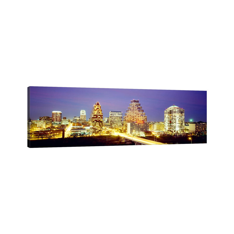 Buildings Lit Up At Dusk, Austin, Texas, USA by Panoramic Images - Wrapped Canvas Panoramic Print