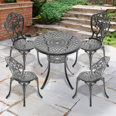 Ensemble de repas d'extérieur en aluminium moulé pour 4 personnes, noir, motifs élégants, revêtement résistant aux intempéries, assise confortable, protection anti-effraction, ergonomique