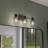 3-Light Matte Black Vanity Light with Clear Ribbed Glass Shades