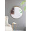 Miroir de conception classique avec forme ronde et cadre d'inspiration baroque pour la salle de bain, console de vestibule posée contre le mur-1032617504-1032617507