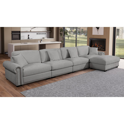 Canapé modulaire moderne en L avec repose-pieds mobile