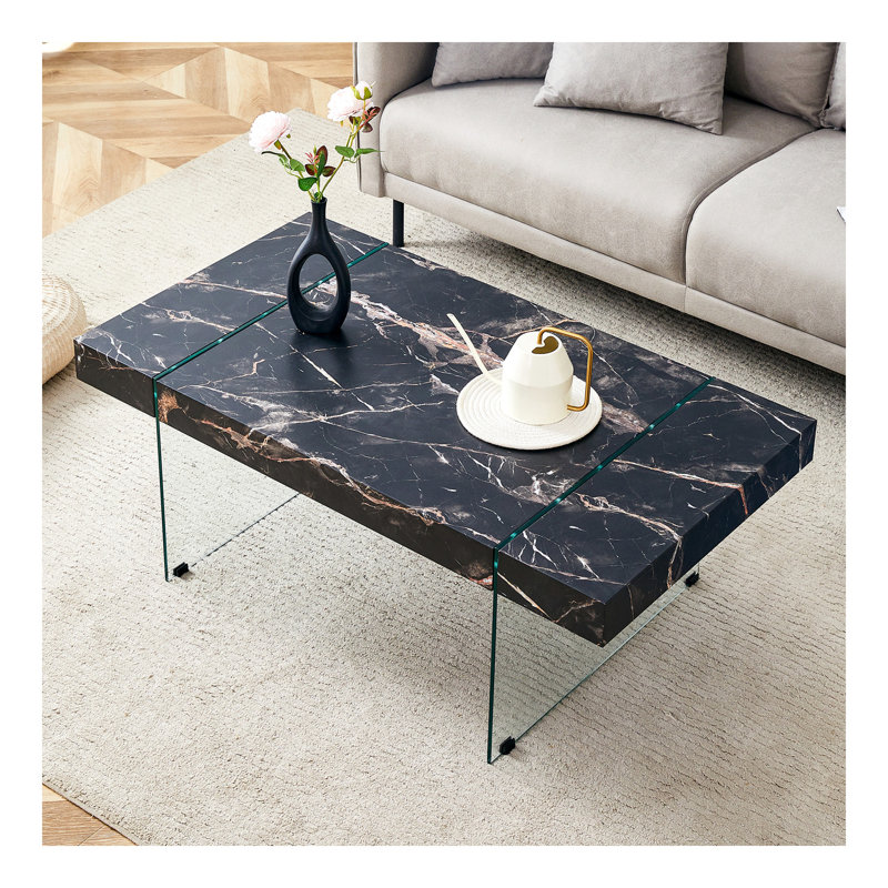 Table basse 43,3 po x 23,6 po en MDF à motif de marbre noir avec pieds en verre trempé. Convient au salon. Elle peut être utilisée non seulement comme table basse, mais aussi comme table d'appoint ou présentoir.