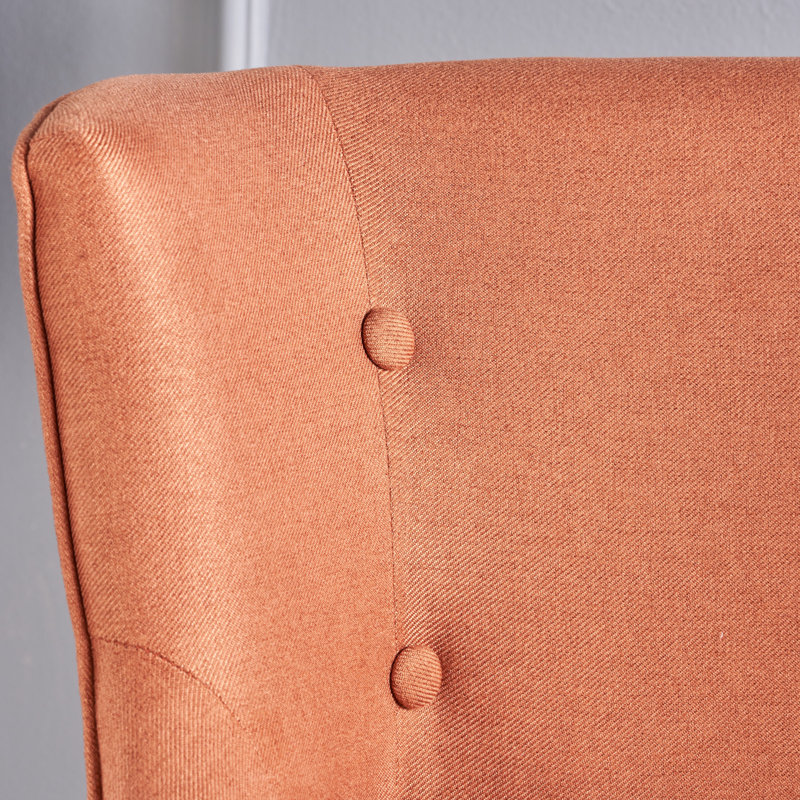 Fauteuil à oreilles capitonné Staas, 100% polyester orange