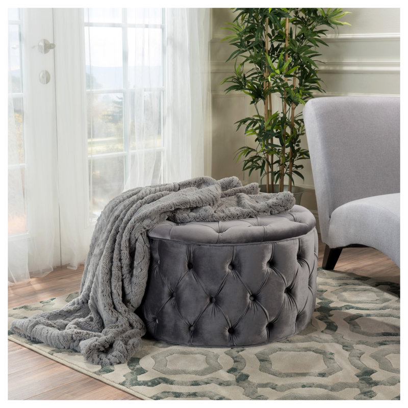 Repose-pieds rond en velours gris avec rembourrage moelleux