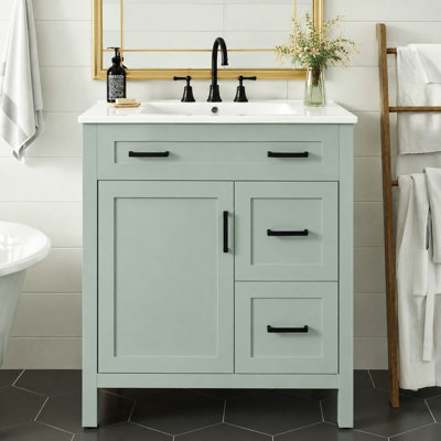 Meuble-lavabo 30 po vert sauge avec lavabo en céramique, structure en bois massif, 2 tiroirs à fermeture en douceur, 1 porte à fermeture en douceur, tablette réglable et poignées noires