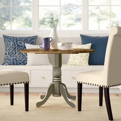 Philipston Extendable Round Solid Wood Dining Table