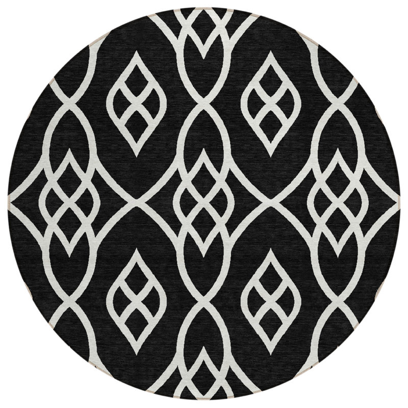 Tapis intérieur / extérieur rond 8 pi noir et ivoire lavable à treillis