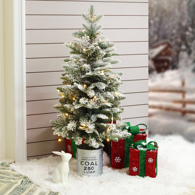 Arbre de Noël illuminé par la neige, 3'