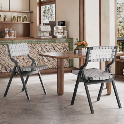 Chaises de salle à manger pliantes en bois avec siège tissé et dossier en sangle, empilables et peu encombrantes pour la cuisine ou la salle à manger.