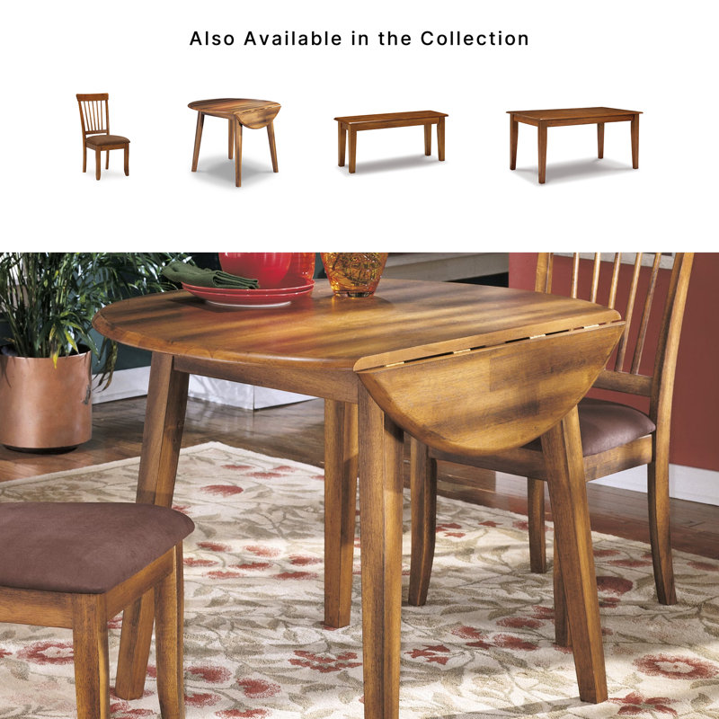 Tanan Extendable Round Solid Wood Base Dining Table