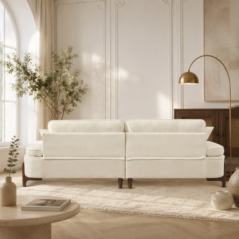 Canapé confortable à assise profonde avec coussin moelleux, idéal pour les espaces variés