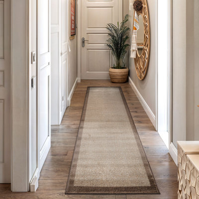 Tapis moderne à motif géométrique moderne à bordure