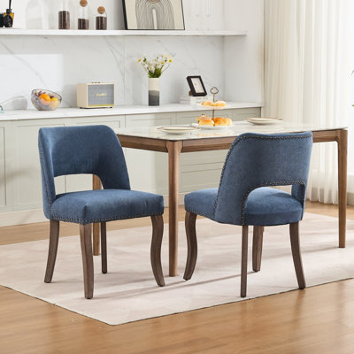 2 chaises de salle à manger bleues avec tissu respirant, ressorts en S et rembourrage en mousse, pieds élégants en bois courbé pour les espaces