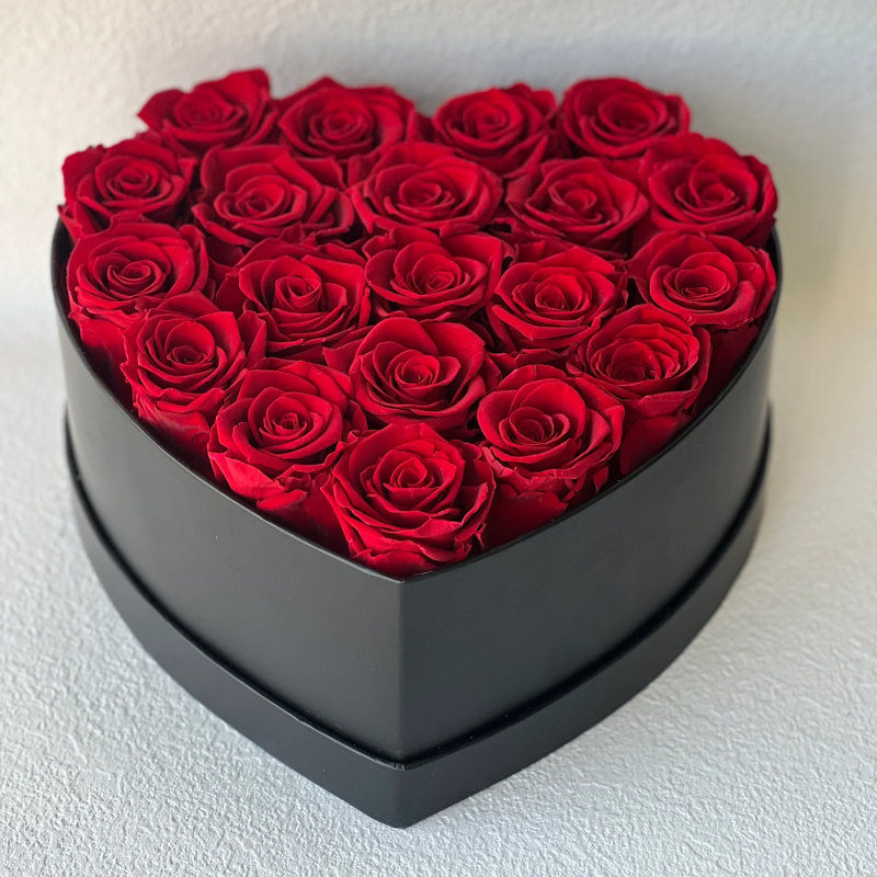 Arrangement de roses en boîte