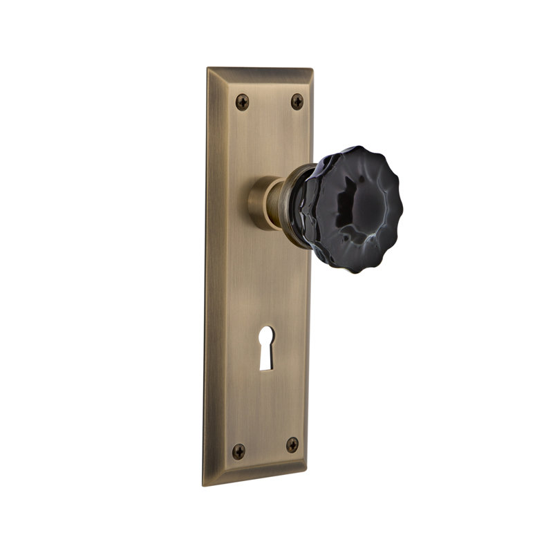 New York Plate with Decorative Keyhole and Crystal Black Door Knob, Antique Brass, 2 3/8