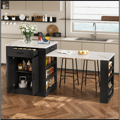 Console d'îlot extensible avec tiroirs, armoire à deux portes et tablettes ouvertes. Sert de table à manger, de bar pour le petit-déjeuner temporaire et de salon de thé l'après-midi, noir