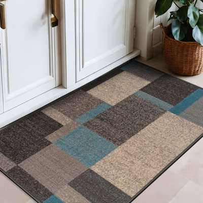 Tapis bleu tissé à la machine Bolk