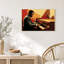 Tableau mural sur toile représentant un pianiste stylisé jouant du piano à queue rouge et orange-789428113