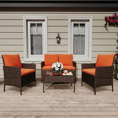 All-Weather 4-Piece Patio Bistro Set – Brown Gradient Rattan Conversation Furniture, Glass Coffee Table, Orange Washable Cushions, Orange Cushion