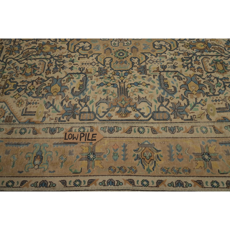 Tapis traditionnel 8 x 11 avec des tons terreux pour un décor intemporel