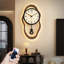 Horloge murale brune-129417711