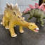 Petite statue de dinosaure stégosaure