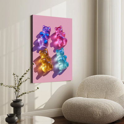 Tableau représentant des oursons gélifiés transparents et colorés sur fond rose, grande toile tendue sur châssis pour salon ou chambre.