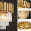 Lustre à plusieurs niveaux avec lumière en cristal