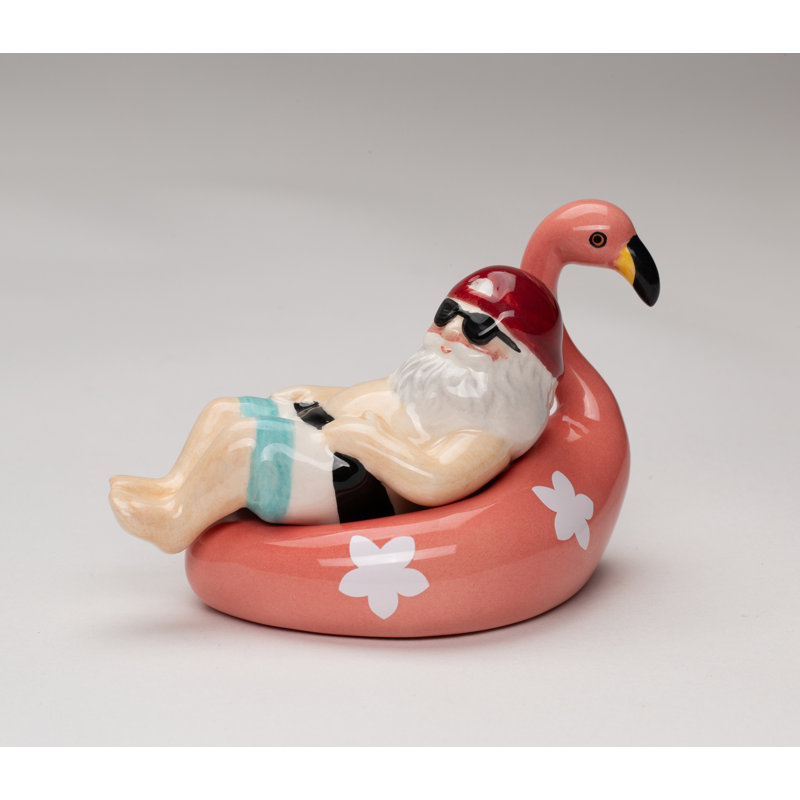 Santa Relaxing On Flamingo Salt And Pepper