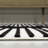 Anders MidCentury Modern Arch Stripe Two-Tone High-Low Black/White Rug-1064061348