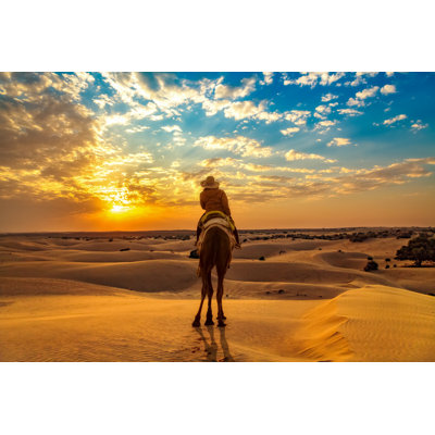 Tourist Enjoying Camel Ride by Roop_Dey - Wrapped Canvas Print