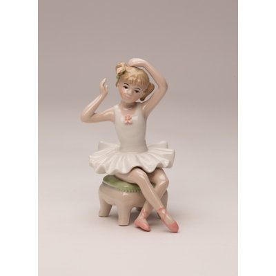 Ballerina Sitting On The Chair