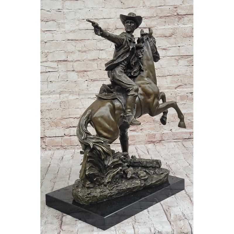 Statue de bronze d'un cowboy de l'Ouest