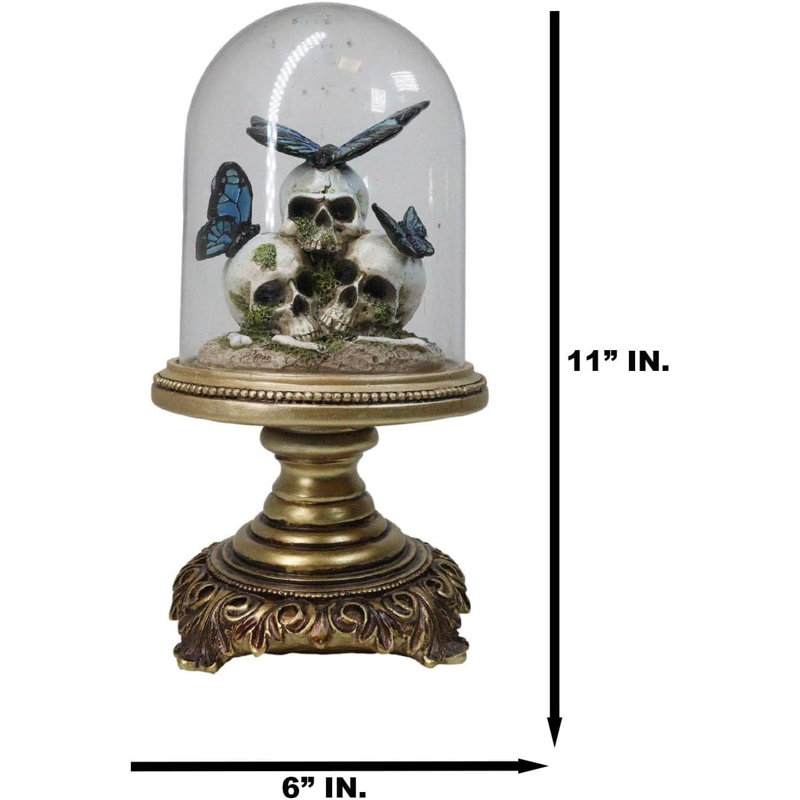 Figurine macabre crâne avec papillons monarques