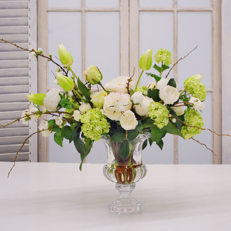 Arrangement floral mixte en vase