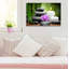 Orchidée mauve avec bougies, pierres de massage et bambou - impression sur toile tendue-56324624