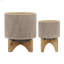 Ensemble de pots à fleurs en céramique avec motifs artistiques et supports en bois pour décor chic