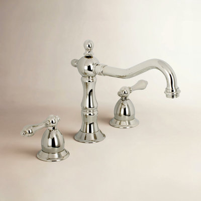 Kingston Brass Heritage Two-Handle 3-Hole Deck Mount Widespread Bathroom Faucet with Brass Pop-Up Drain