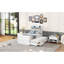 Lit simple blanc avec prises de tête de lit et grand espace de rangement avec décoration élégante
