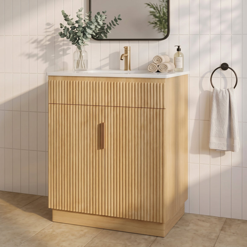 Meuble-lavabo sur pied cannelé de 71 cm (28 po) avec lavabo en céramique intégrée, tablette réglable, faux tiroir et portes à fermeture amortie, chêne naturel