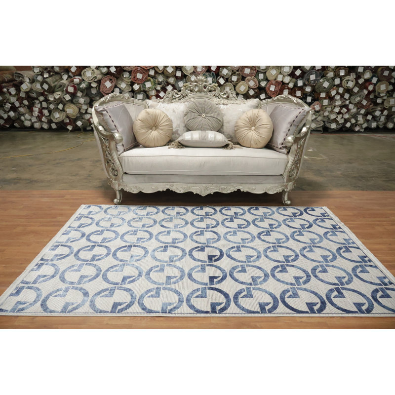 Tapis sophistiqué à motif de cercles dans des tons de bleu doux 5 x 8