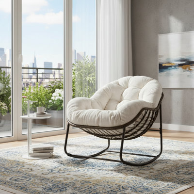 Oversized White Egg-Shaped Papasan Rocking Chair With Striped Velvet Cushions And A Comfortable Egg-Cage Design. Suitable For Front Porch, Garden, Patio, And Backyard.