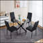 Table de salle à manger moderne noire avec pieds croisés en métal et verre trempé, parfaite pour les salons élégants et peu encombrants-2052337873