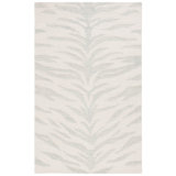 Tapis ivoire / vert en coton touffeté à la main Jerramy