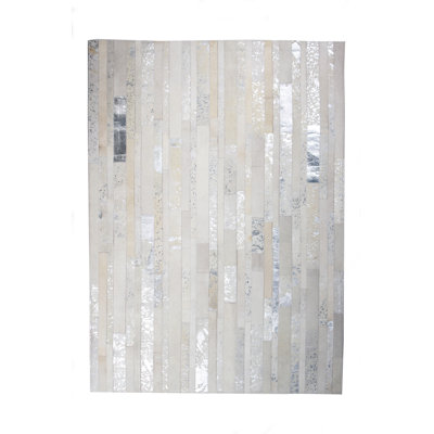 Iyaad Cowhide Patchwork Indoor Rug