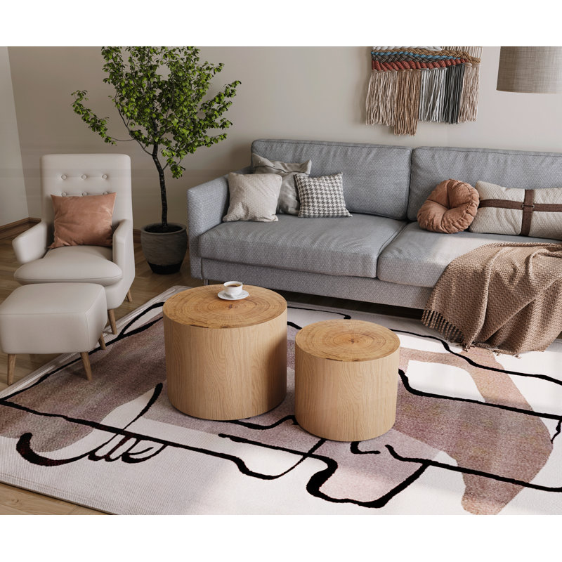 Ensemble de 2 tables gigognes rondes modernes Nesting Carlie avec de véritables tranches d'anneaux pour de petits espaces et une utilisation polyvalente
