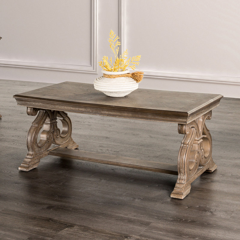 Table basse traditionnelle en bois massif et placage avec pieds à volutes incurvés, couleur chêne vieilli, largeur moyenne de 28 pouces, apparence moyenne, 52 po