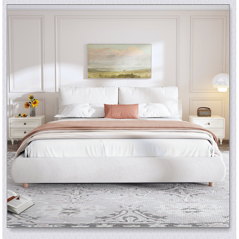 Lit plateforme tapissier avec deux coussins amovibles en tissu Boucle